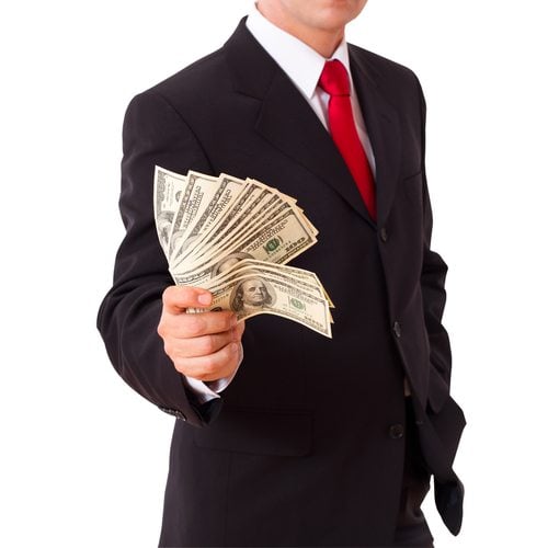 businessman holding money