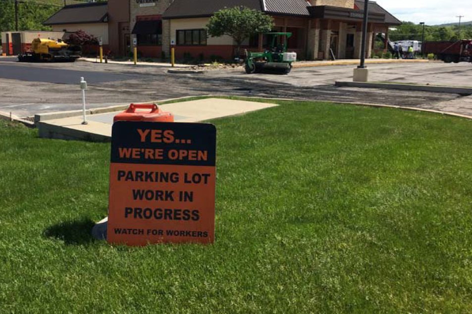restaurant open sign during pavement project