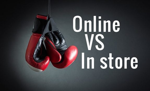 Online Vs In Store with boxing gloves