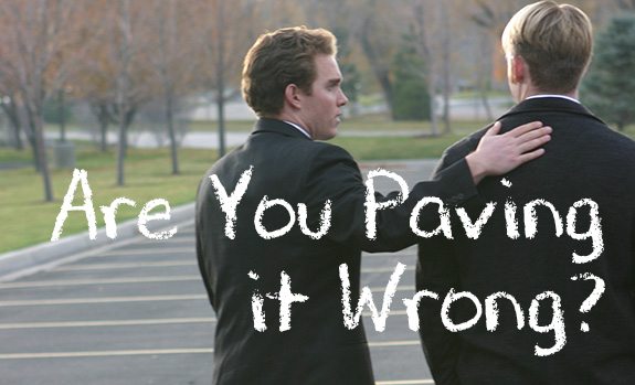 businessman consoling another businessman