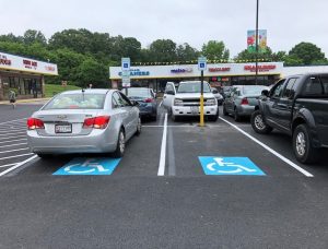 parking spot with no accessibility for second stall
