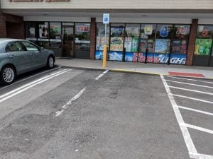 handicap sign corresponding to wrong parking spot