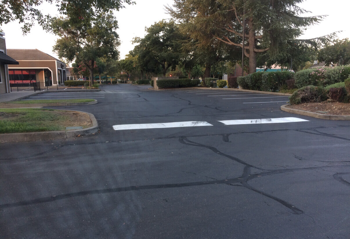 parking lot with cracks sealed