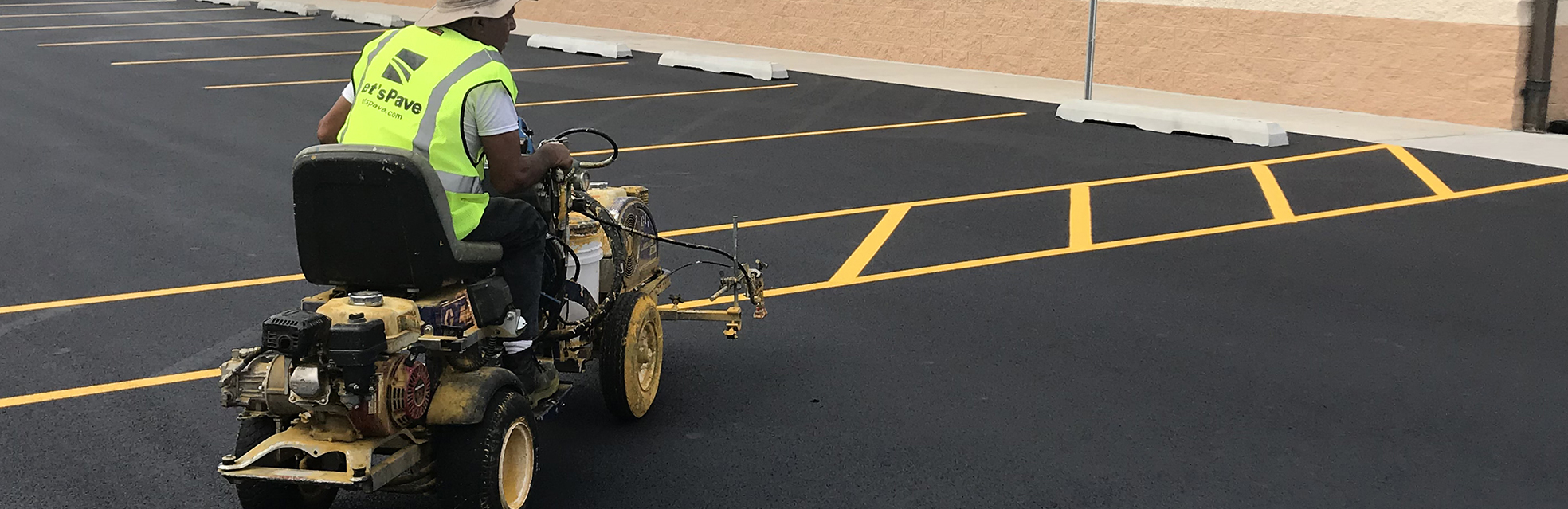 contractor for Let's Pave striping parking lot
