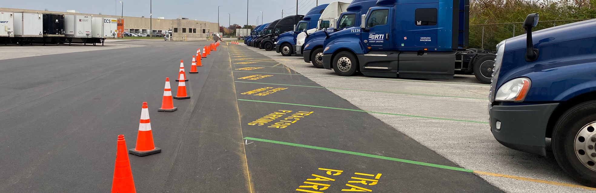parking lot in distribution center with new line markings and asphalt