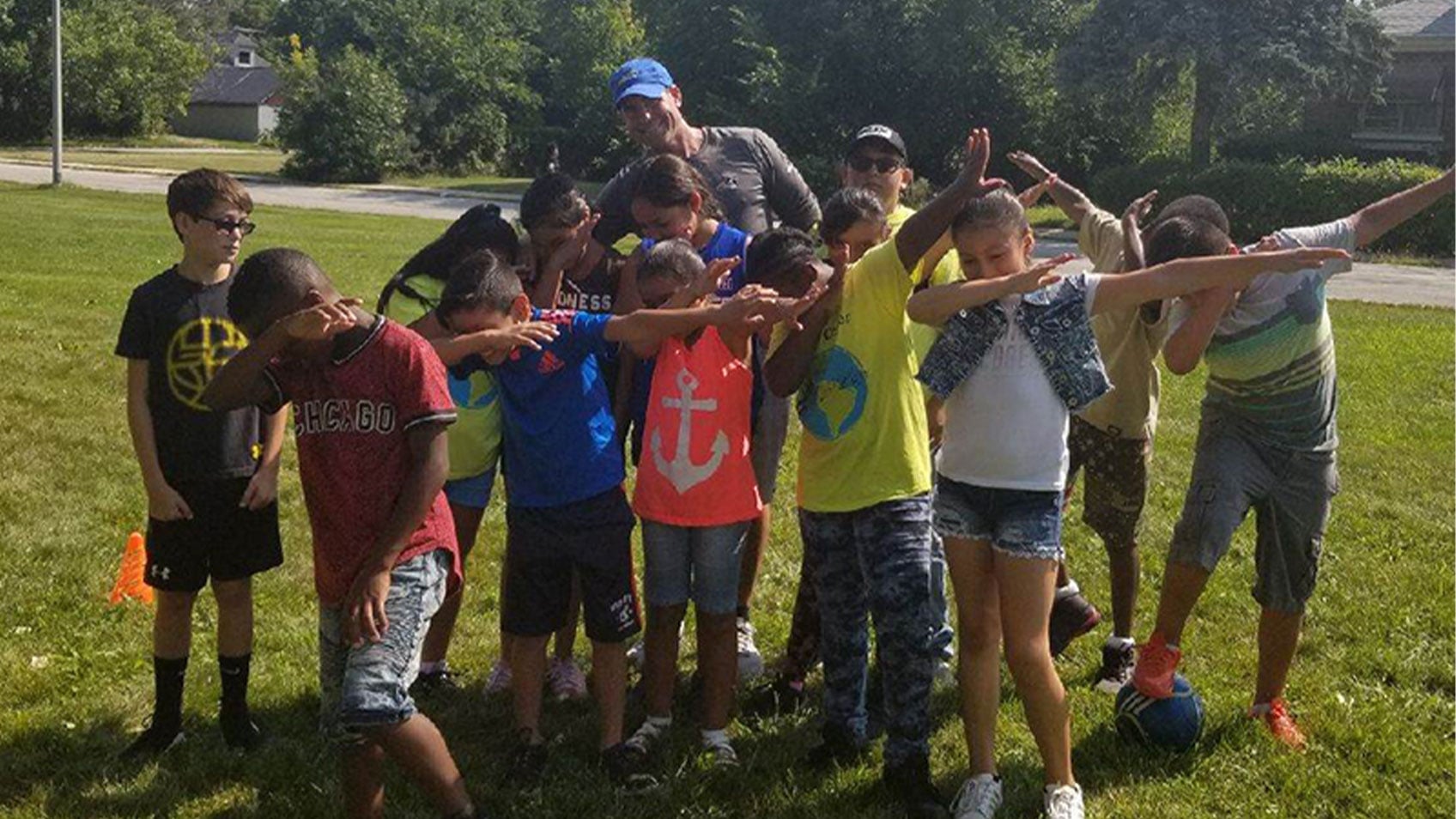 Let's Pave owner volunteering with children