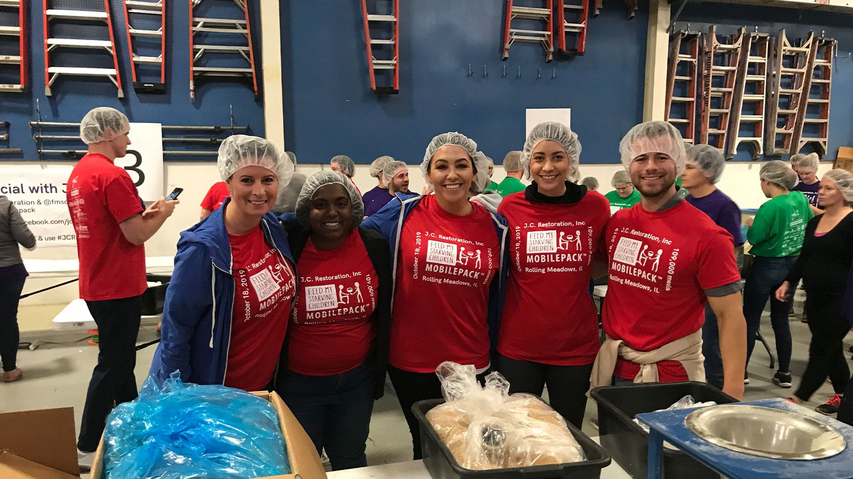 Let's Pave serving food at volunteer event