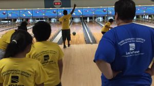 Let's Pave bowling at volunteer event for children